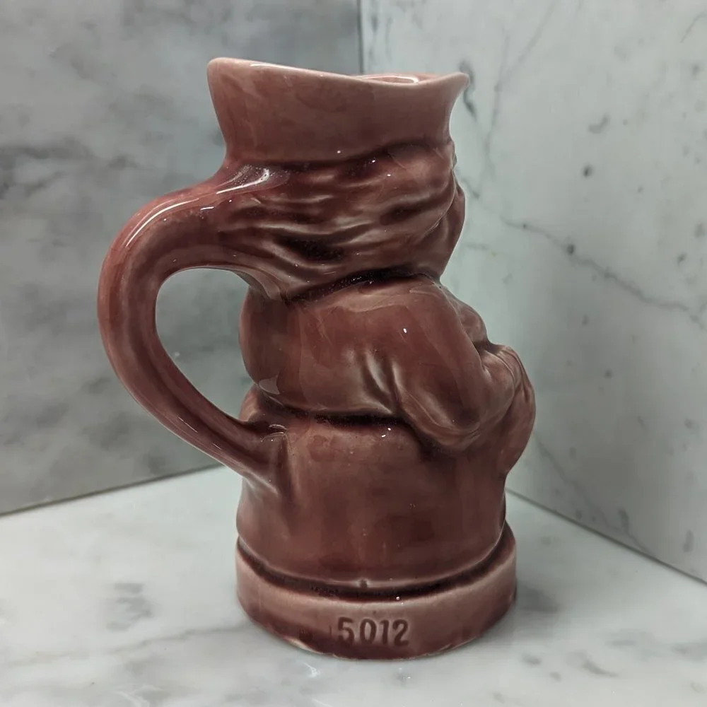 Vintage rose colored glazed pottery creamer from Czechoslovakia